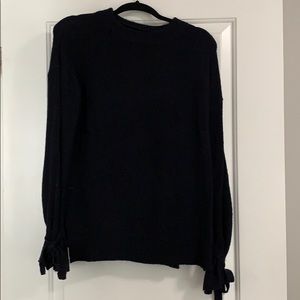 BLACK SWEATER WITH WRIST TIES
